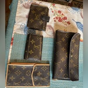 Vintage Louis Vuitton wallets and glasses case